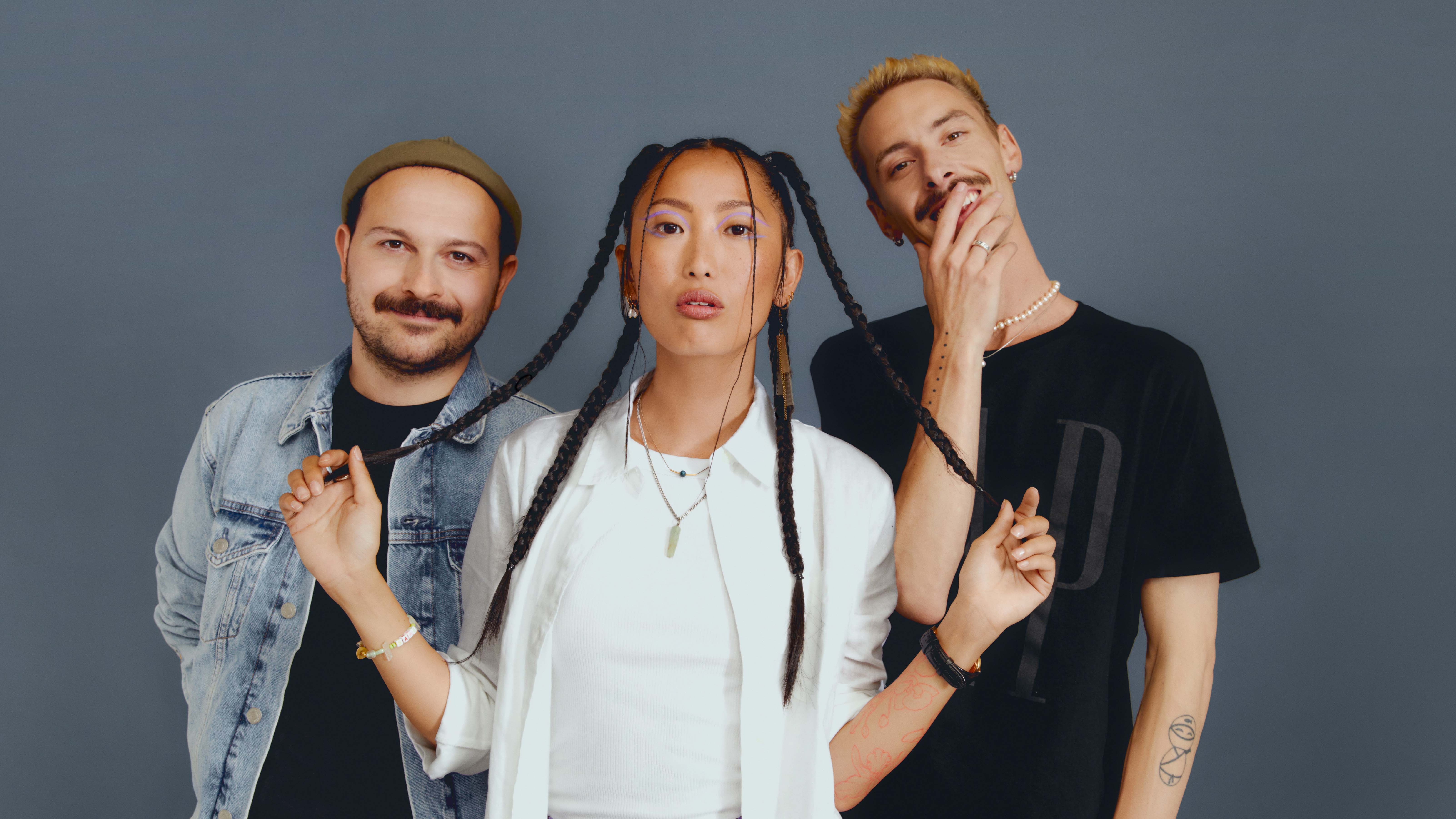 Group photo of the three models of the ZMS campaign for GAP: Harun, Zoe, and Adam.