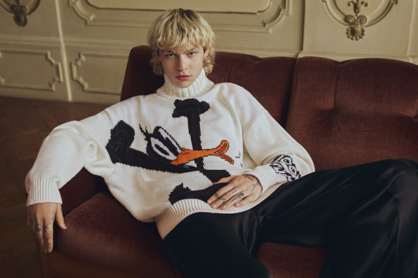 Fashion model lounging on a sofa