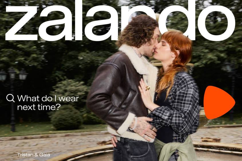 Young couple kissing outdoors; big Zalando wordmark; the copy reads: What do I wear next time?