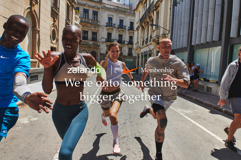 Young people in sportswear running in the street; copy: Zalando, Nike, we are creating something bigger together