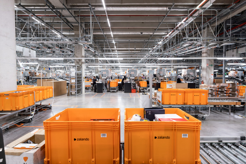 Orange tubs on conveyor belts