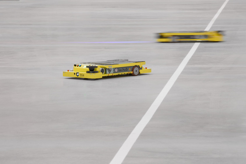 Automated transportation vehicles on a warehouse floor