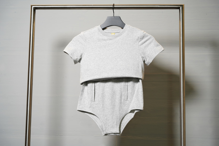 Grey t-shirt showing the body under layer with discrete openings