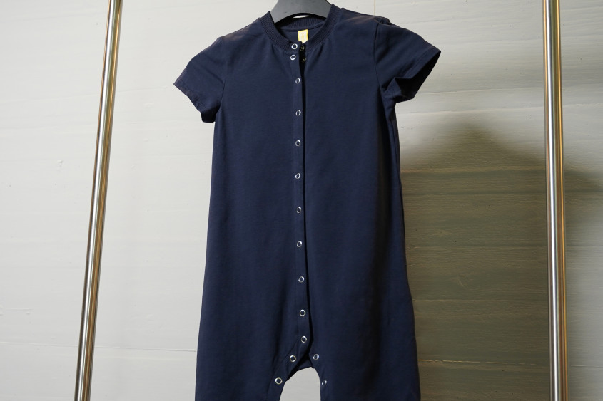 Dark blue body with short sleeves and buttons on the front side