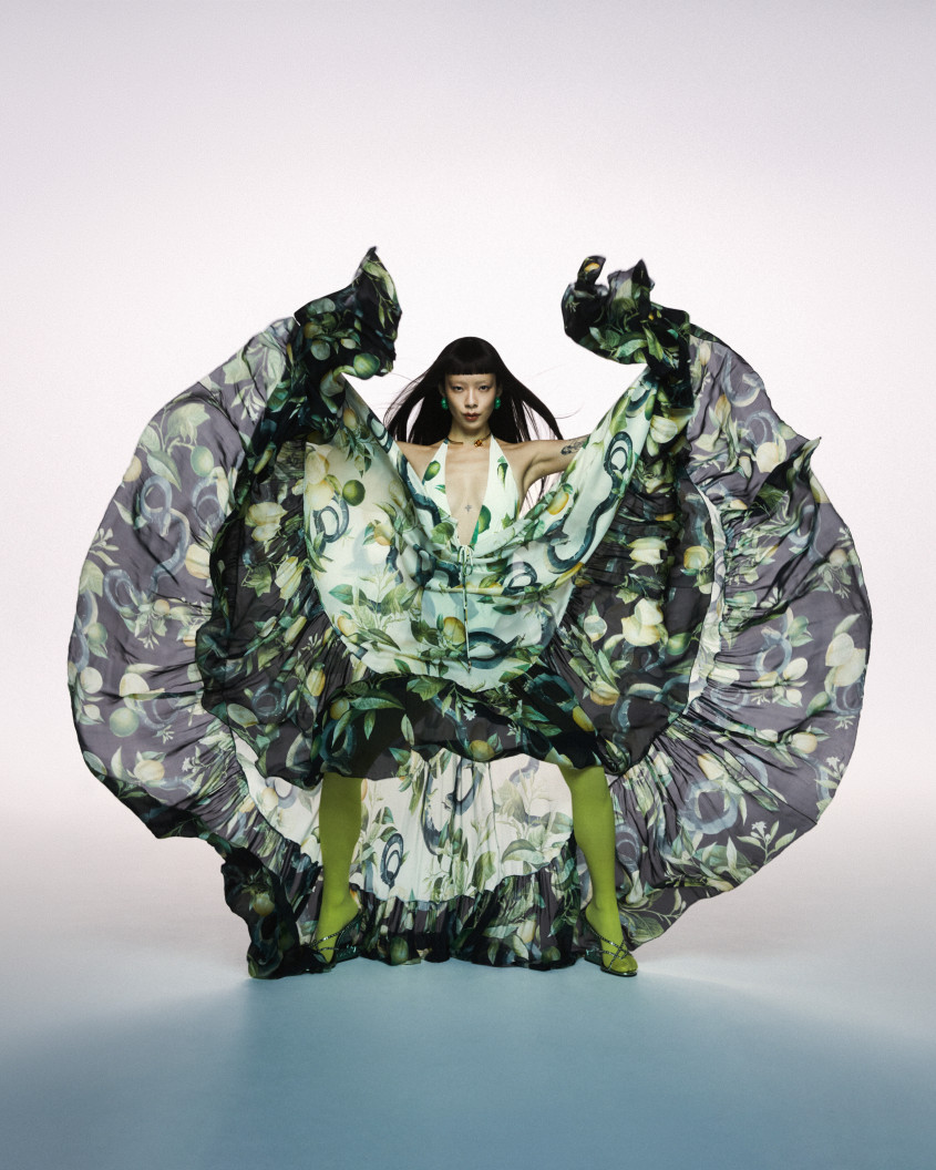 Rina Sawayama in a very colorful and large outfit, fanned out like a butterfly for Zalando