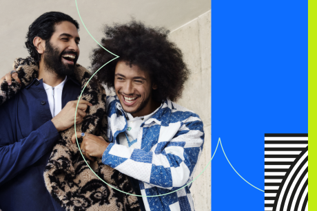 Two models laughing and hugging along with colourful design elements.