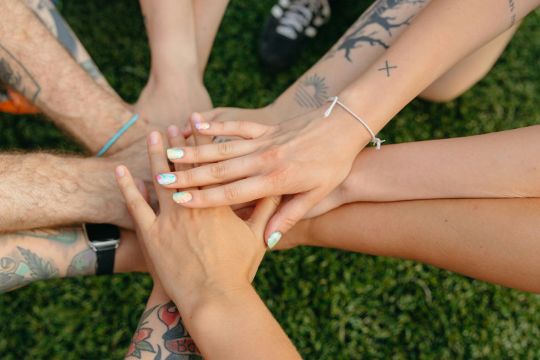 different hands together