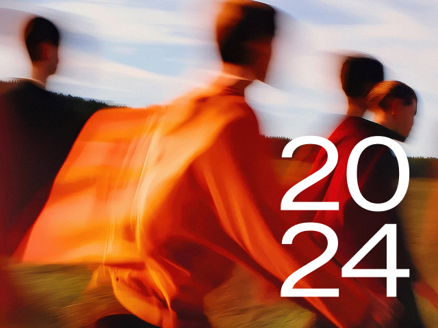 Annual Report 2024 2024 - blurry background image showing a group of people walking in the golden light of low sun