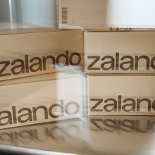 Slightly blurry picture of five Zalando-branded parcels