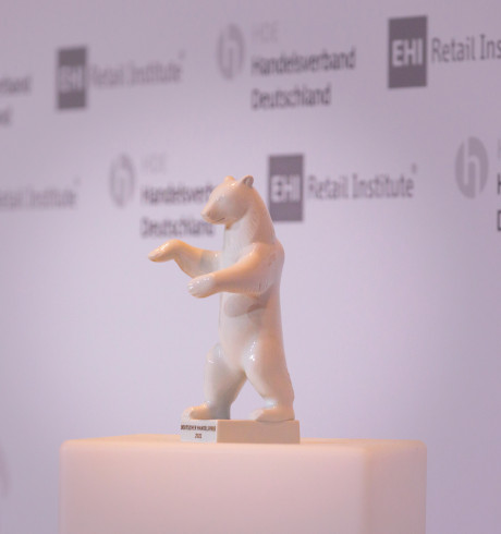 a trophy, a white bear, on a pedestal