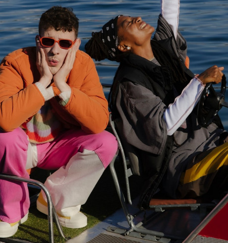 Nemo and KT Gorique on a boat in the sunshine