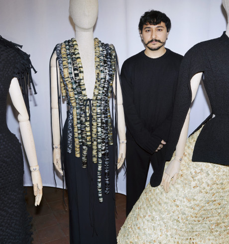 Galib Gassanoff standing between his designs