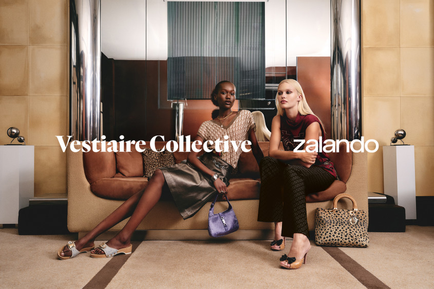 Two women lounging on a designer sofa