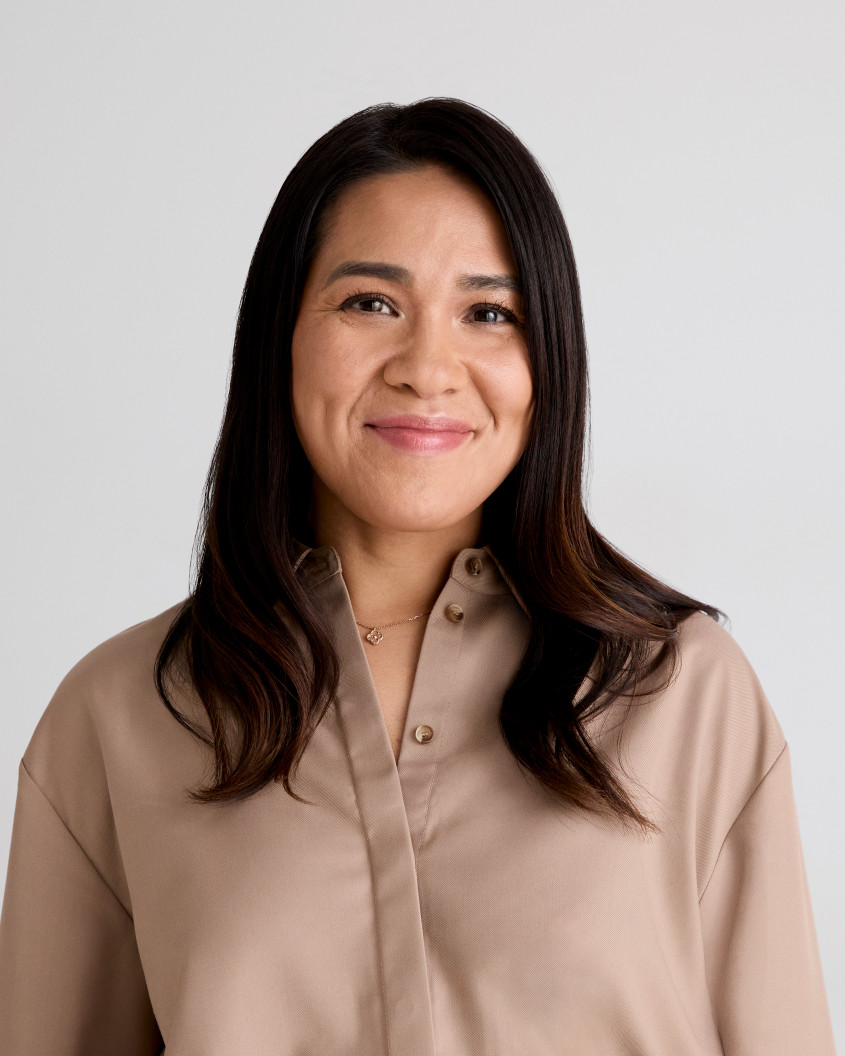 Virginie Duigou Virginie Duigou smiling at the camera