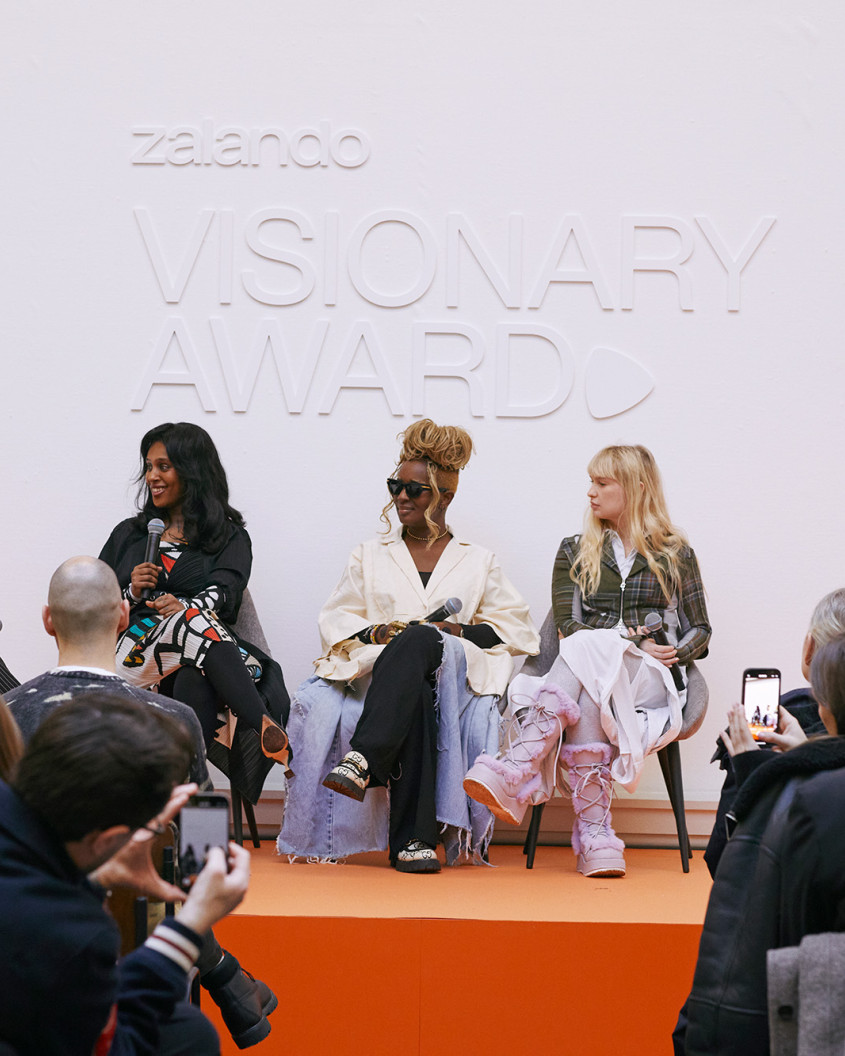 The finalists on stage during panel discussion